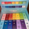 A variety of Sauce disposable vapes in different colors and strains arranged for a bulk wholesale order