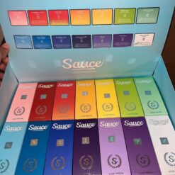 A variety of Sauce disposable vapes in different colors and strains arranged for a bulk wholesale order