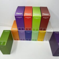 A variety of Sauce disposable vapes in different colors and strains arranged for a bulk wholesale order